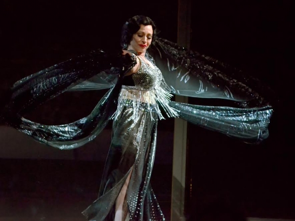 Ann Crumb, dressed like an exotic bird, ready to take off in her final scene in Sunset Boulevard at the Media Theatre. Photo by Mark Jordan.