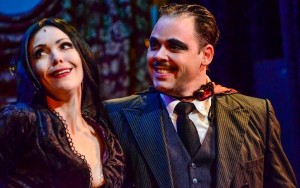 Morticia and Gomez (Jennie Eisenhower and Jeff Coon) share a goofy sexy and totally unique moment. Photo by Chris Jordan.