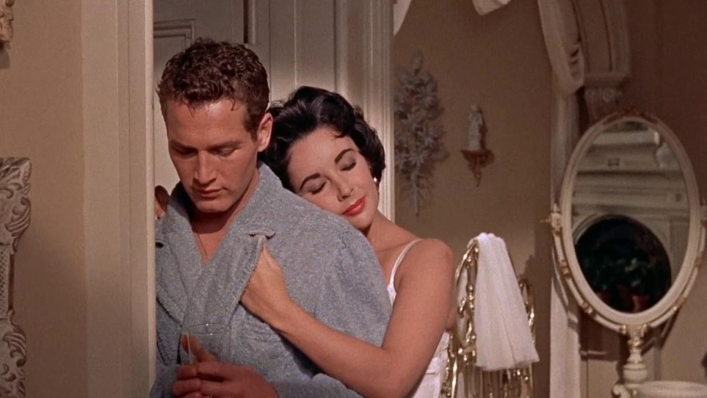 Paul Newman and Elizabeth Taylor in the 1958 film adaptation of CAT ON A HOT TIN ROOF.