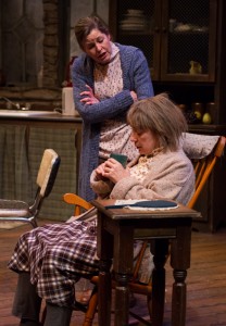 Megan Bellwoar (standing) and Mary Martello (seated) as Maureen and Mag Folan in Lantern Theater Company’s production of Martin McDonagh’s THE BEAUTY QUEEN OF LEENANE. Photo by Mark Garvin.