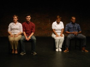  A scene from of the CHECKLIST by Renee Lucas Wayne, one of the highlights of 1MPF: (L to R): Meredith Sonnen (white mother), Arlen Hancock (her son), Lynne Bell (black mother), Chadwick A. Rawlings (her son). Photo credit: Seth Rozin.