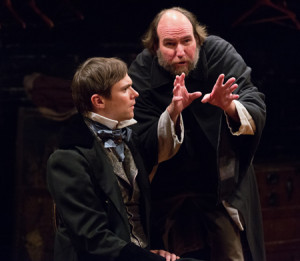 Josh Carpenter as Pip and Brian McCann as Magwitch in Arden Theatre Company's production of GREAT EXPECTATIONS. Photo by Mark Garvin.