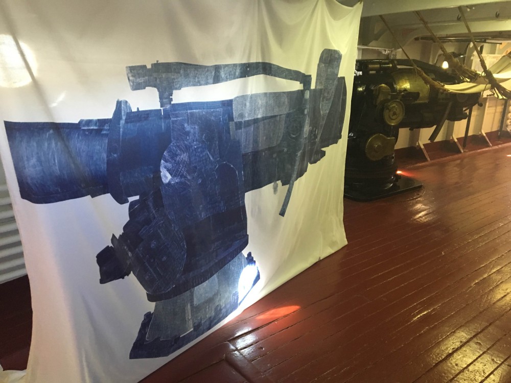 Sarah Kabot's "Toll", part of ARTSHIP OLYMPIA, challenges in fabric the aggressive physicality of the Olympia's large guns.