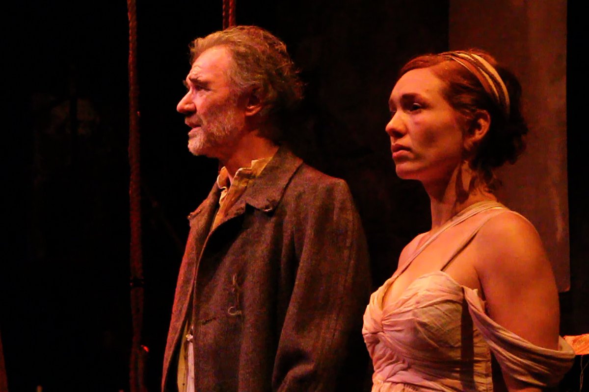 The Poet (Peter DeLaurier) and the Muse (Liz Filios) in AN ILIAD. Photo by Mark Garvin
