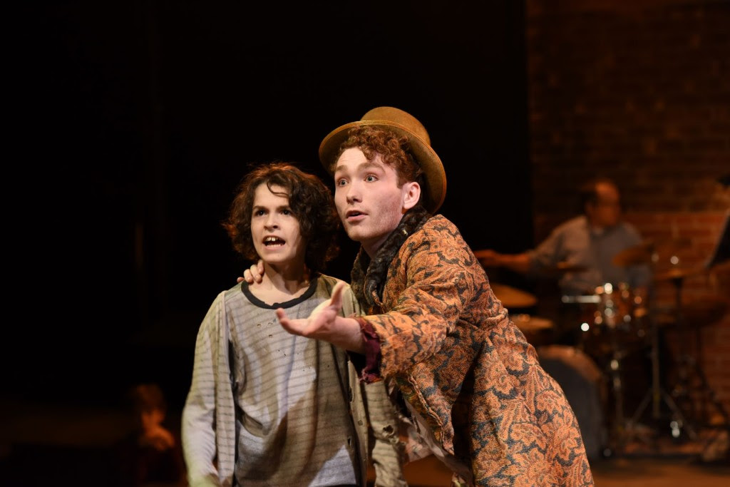 Lyam David Kilker (who shares the role with Bejamin Snyder) as Oliver and Jacob Entenman as The Artful Dodger. Photo by Shawn May.